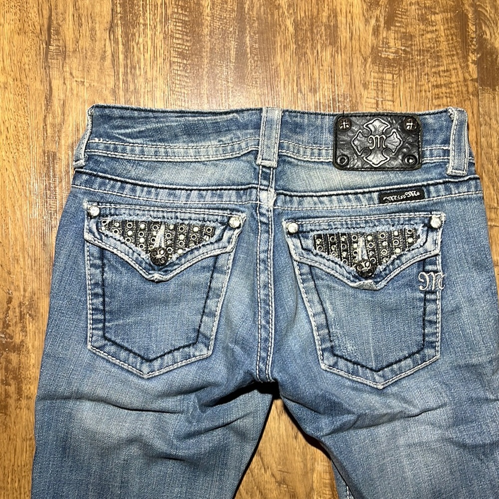 Size 26 Black leather rings and jewel pocket design, Miss Me jeans, boot cut